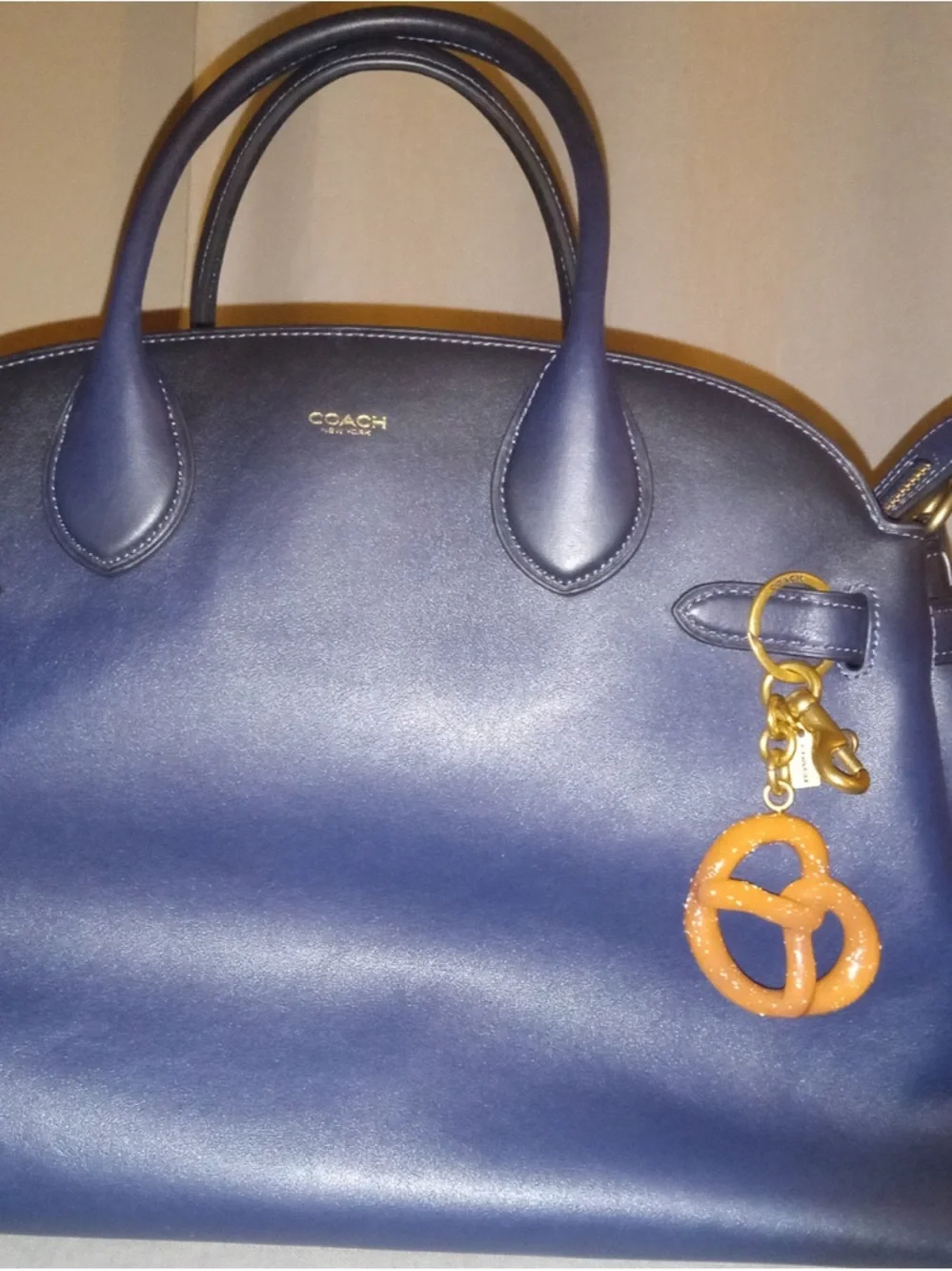 HOT!!!!  Coach Gold-Tone Pretzel Purse Charm in Brown.  NWT and Dusty